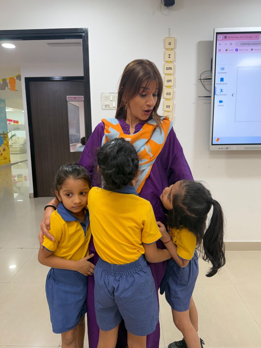 Children with their educator at ACE Juniors