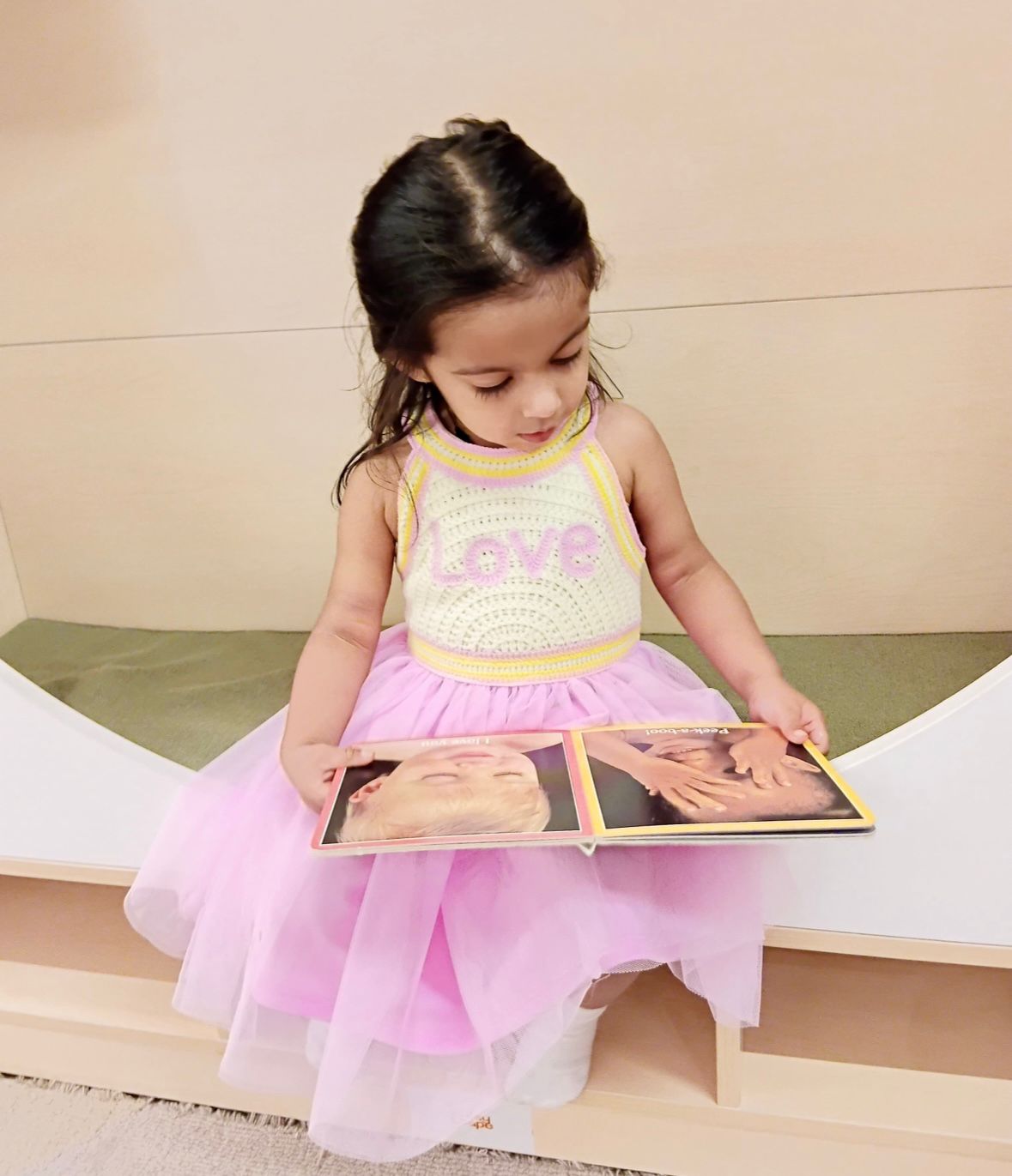 A caregiver reading with a child